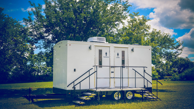 Custom designed restroom trailer with side mount step system